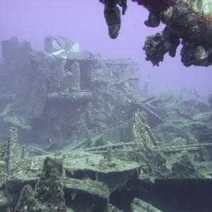 Scuba divers preparing for three tank dive adventure