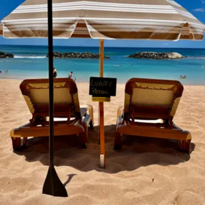 Beach chaise lounge set up on sunny shore