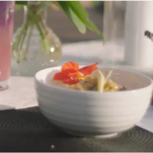 Couple enjoying elegant dinner with ocean view