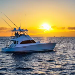 Couple enjoying a limitless private sunset cruise on the ocean