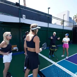 Pickleball players honing skills during advanced drills
