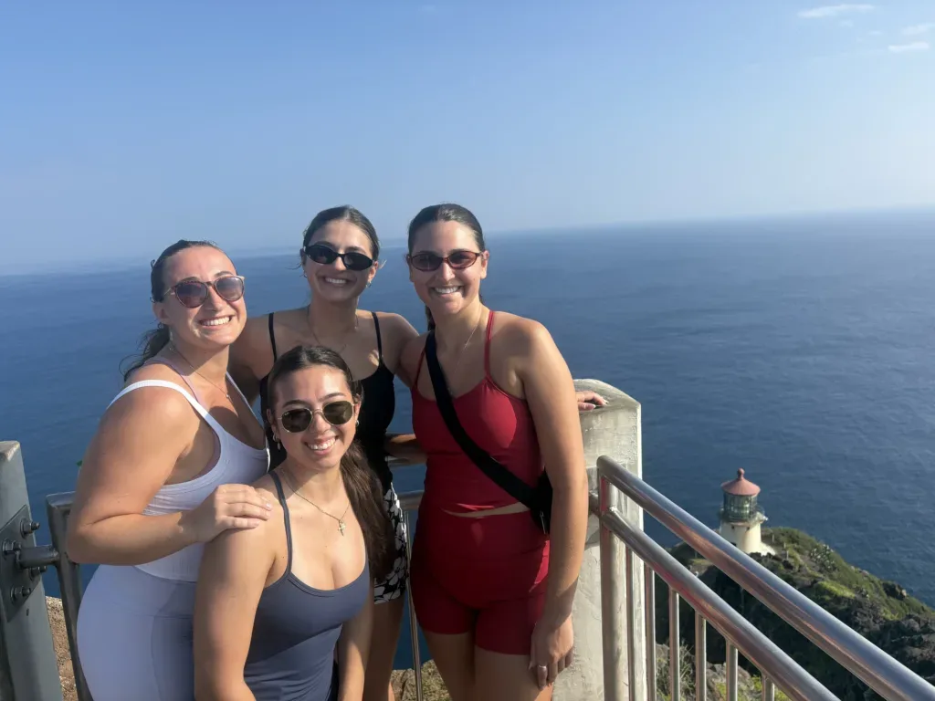 Tour group visiting Diamond Head lookout with ocean backdrop