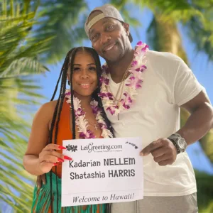 Honeymoon couple receiving lei greeting at Honolulu Airport