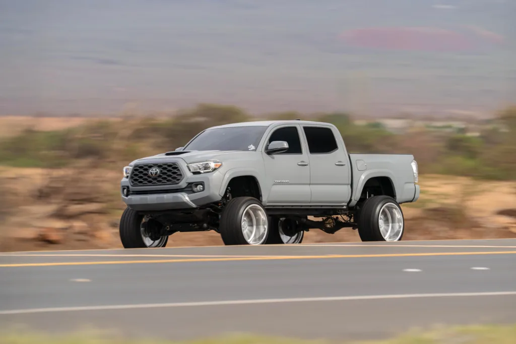 Car and truck photoshoot featuring scenic island backgrounds