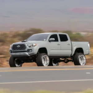Car and truck photoshoot featuring scenic island backgrounds