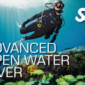 Advanced open water diver exploring deep ocean site