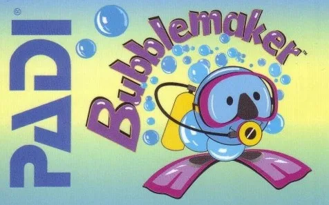 Children learning scuba diving basics in shallow pool