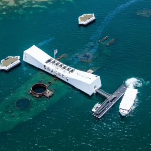 Group enjoying multiple attractions including helicopter ride in Pearl Harbor