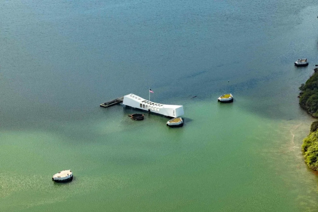 Helicopter flying over Pearl Harbor and Oahu sights