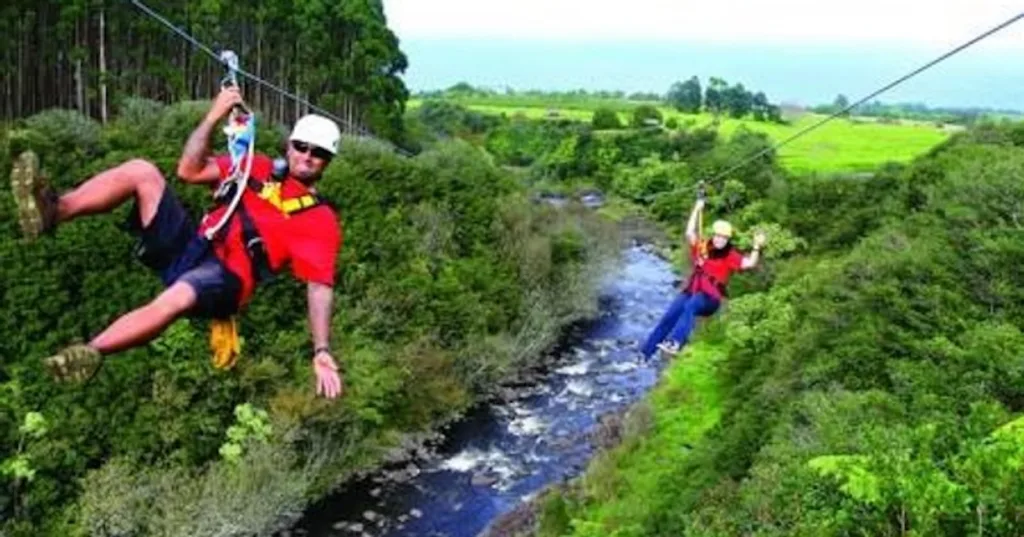 Participants enjoying thrilling 9-line zipline on Big Island
