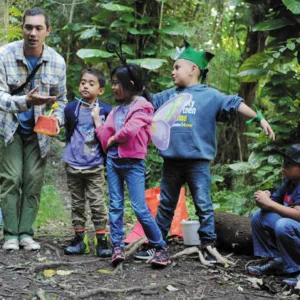 Kids exploring nature during Oahu adventure camp