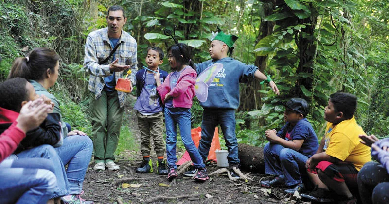 Kids exploring nature during Oahu adventure camp