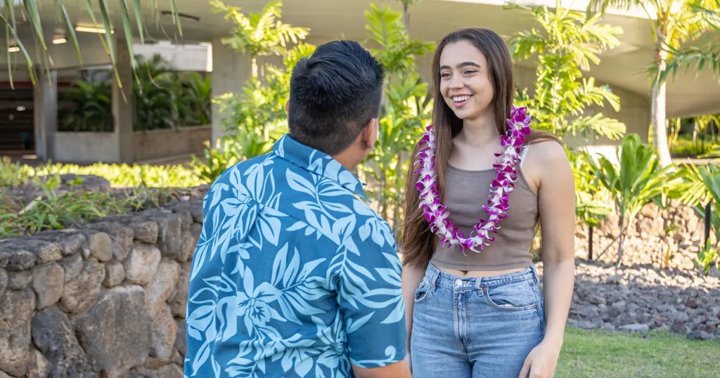 Traveler receiving a traditional lei at Kona Airport