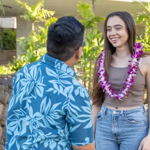 Traveler receiving a traditional lei at Kona Airport