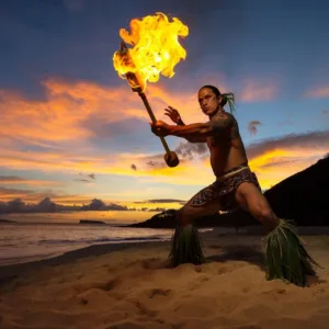 Guests enjoying Hawaiian luau feast outdoors