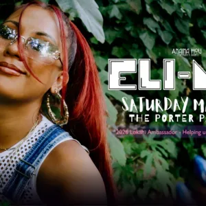 Eli-Mac performing live with her band on stage