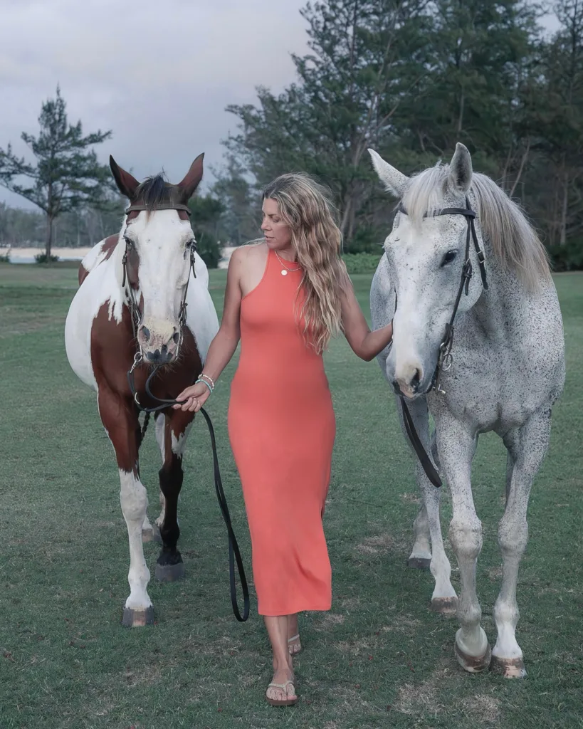 Sunset photoshoot featuring horse on beach setting