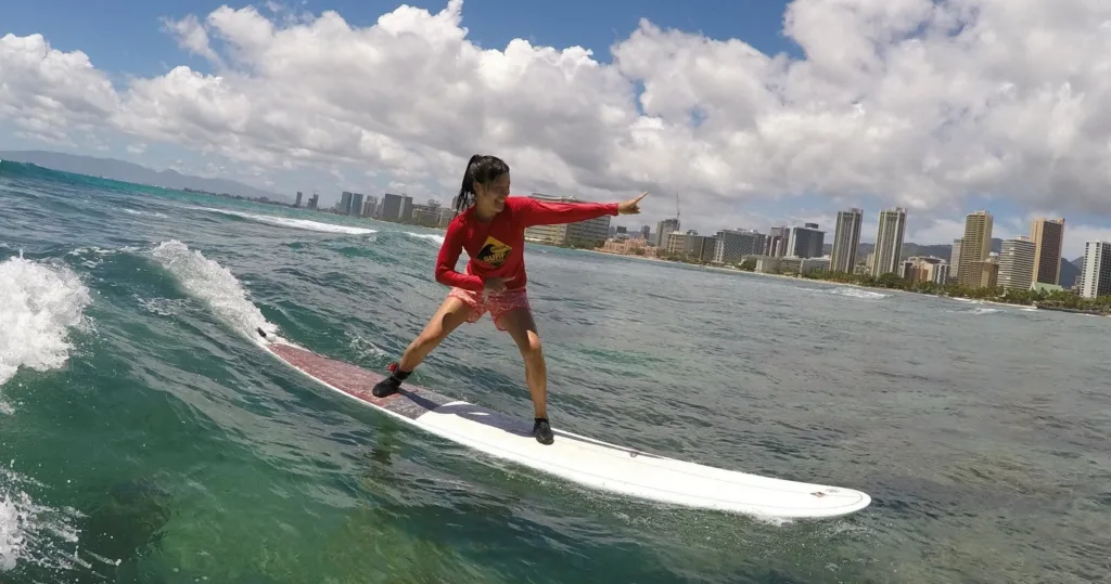 Surf lessons for beginners on gentle island waves