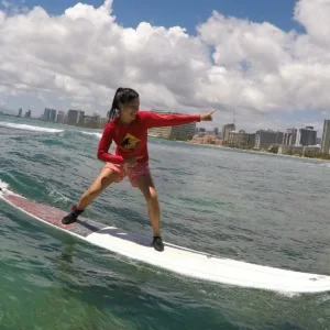 Surf lessons for beginners on gentle island waves