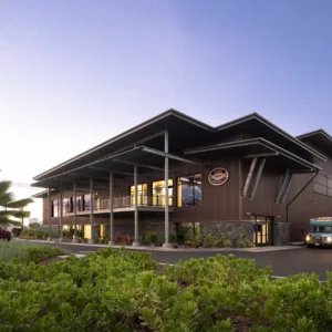 Tourists sampling craft beers inside Kona brewery facility