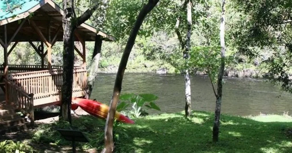 Adventurer enjoying private waterfall swim on Big Island