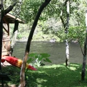 Adventurer enjoying private waterfall swim on Big Island