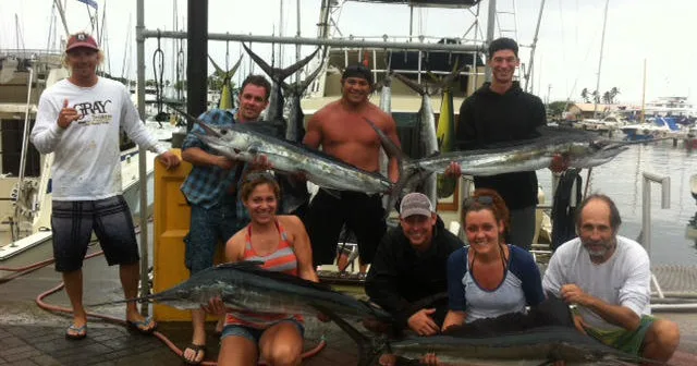 Group fishing charter boat out on the open ocean