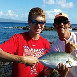 Group enjoying a five hour fishing trip on the shore