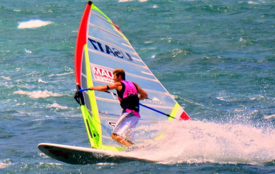 Windsurfing session with rigged equipment ready to sail