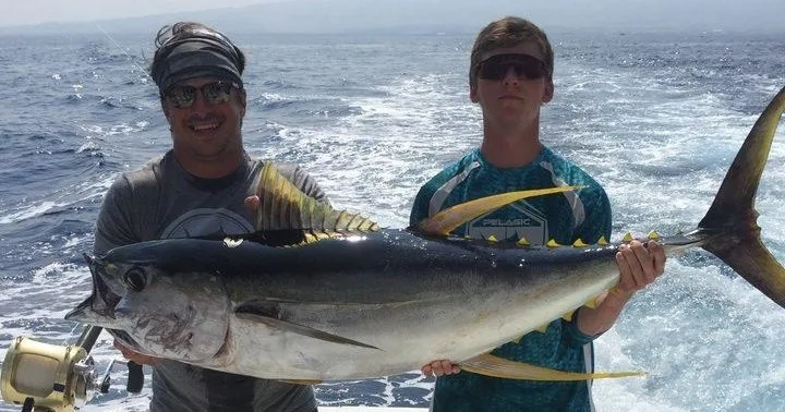 Angler casting fishing line from private boat