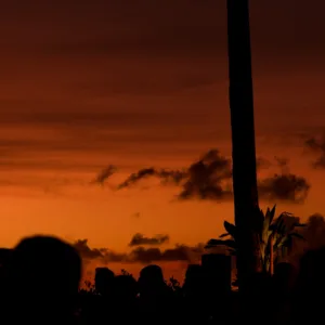 Oceanfront luau stage with Polynesian dancers performing