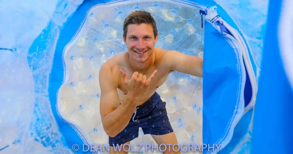 Person inside a giant inflatable aquaball on water