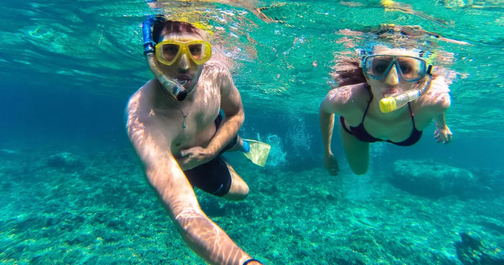 Beach gear including surfboards and chairs for rent