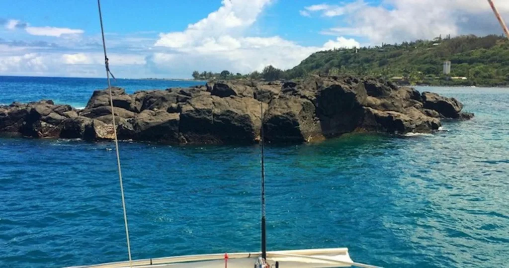Guests snorkeling near coral reefs on North Shore
