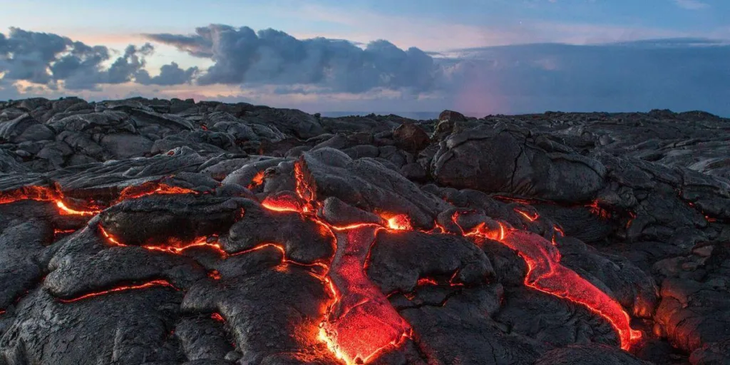 Polaris Slingshot near volcanic landscape on Big Island