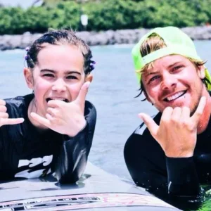 Private surf lesson with instructor guiding student