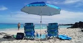 Surfboards and snorkel gear available for rent on beach