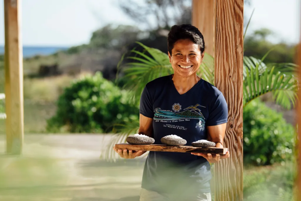 Visitors touring Kona Salt Farm by the ocean