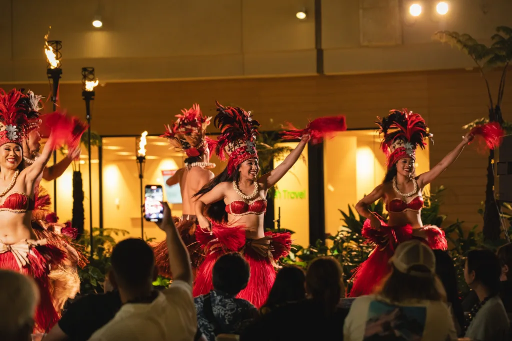 Guests seated in middle section at Waikiki luau