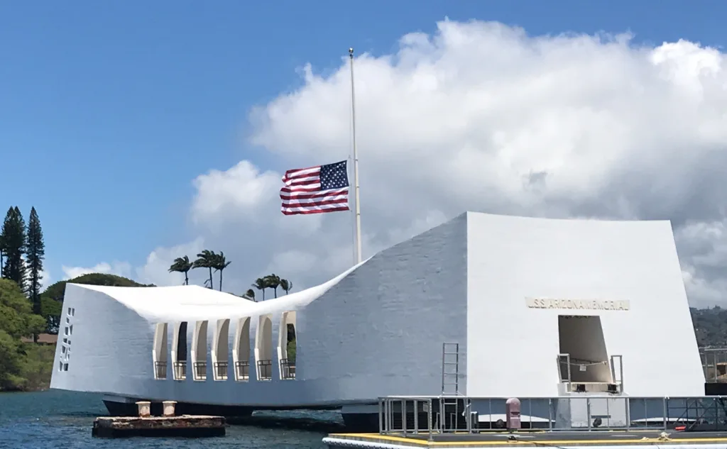 Visitors viewing USS Arizona Memorial at Pearl Harbor