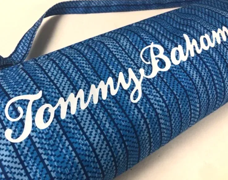 Beach umbrella set up on sandy Honolulu shore