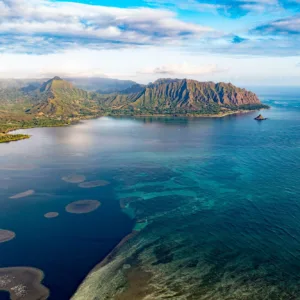 Kayaker paddling toward Kaneohe Bay Sandbar in Hawaii