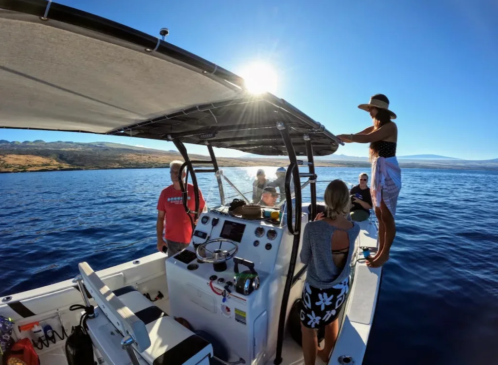 Private boat cruising on calm ocean waters
