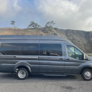 Private shuttle van parked outside Waikoloa hotel