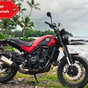 Benelli 500cc motorcycle parked near tropical scenery