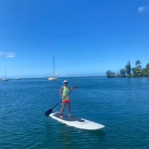 Stand up paddleboard floating on calm water