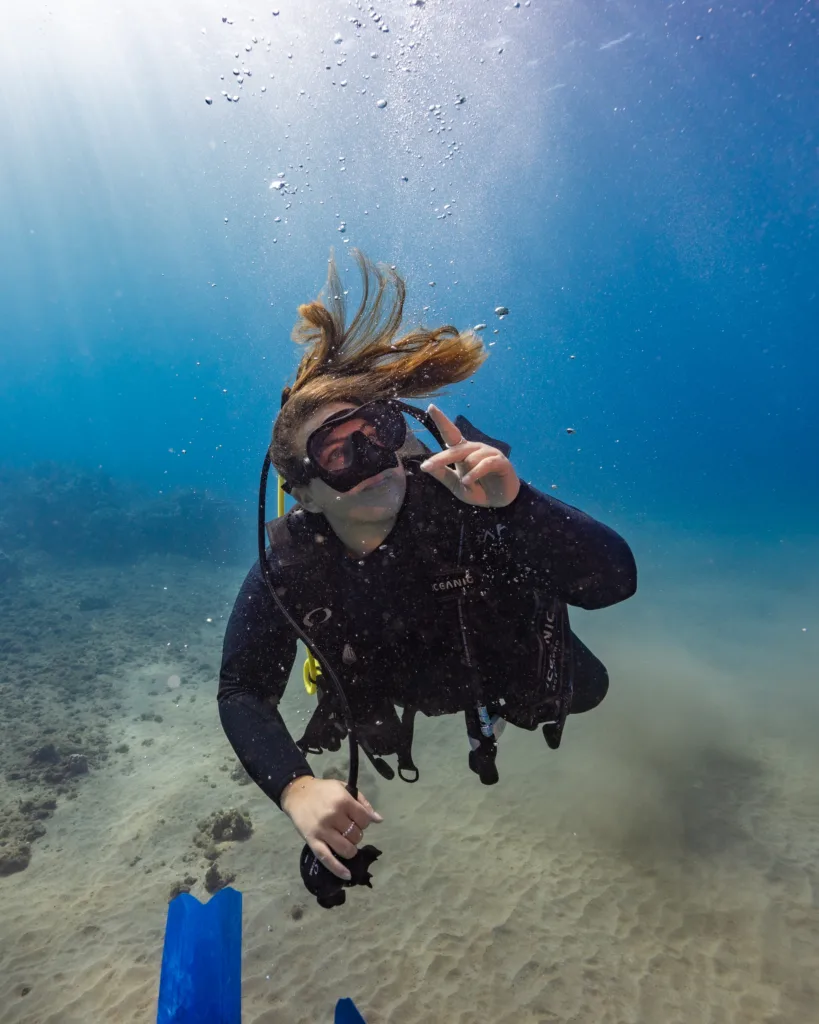 Scuba diving student practicing skills in calm shore waters