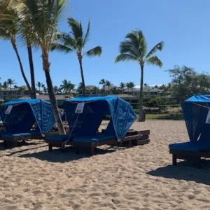 Shaded cabanas set up on beach at Anaeho’omalu Bay