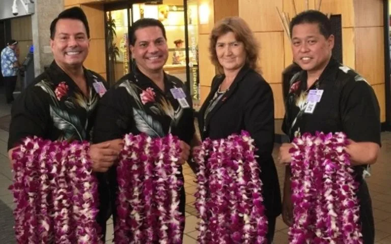 Airport lei greeting service at Lihue, Kauai with fresh flower leis