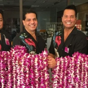 Hawaiian airport lei greeting service at Kona with vibrant leis